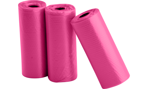Tre ruller med 15 rosa hundeposer, slitesterke og lekkasjesikre, perfekte for ren og praktisk avfallshåndtering på tur.